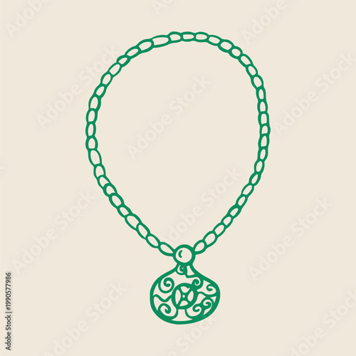 Green decorative necklace with intricate pendant design, featuring a chain of circular links and a stylized ornament hanging from the center