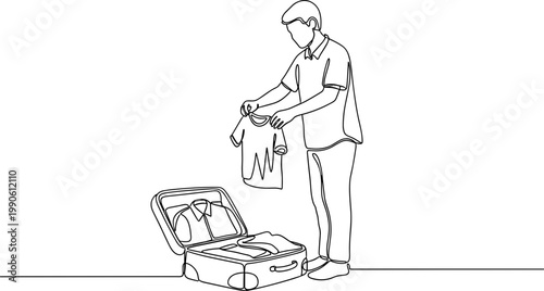 Man packing clothes in suitcase travel.