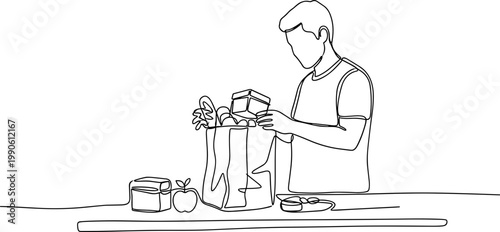 Man preparing coffee in kitchen.