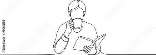 Man reading book and drinking coffee.