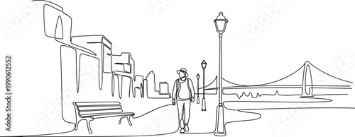 Man walking on city sidewalk alone.