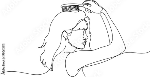 Woman combing her long hair.