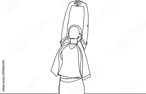 Woman in casual outfit standing still.