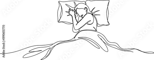 Woman sitting on bed with pillow.