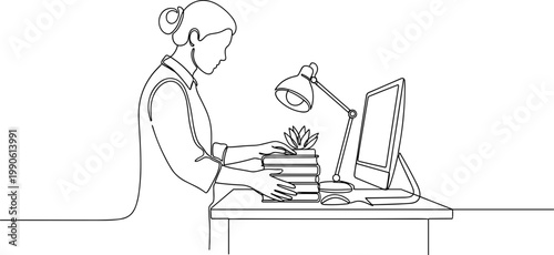Woman working on computer desk.