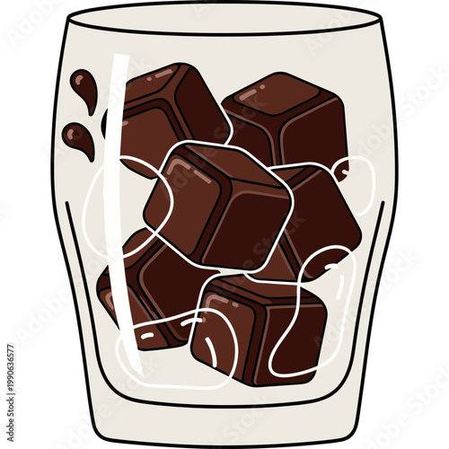 Chocolate cubes melt inside a clear drinking glass on table
