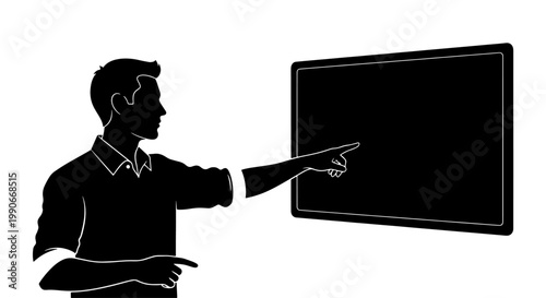 A man's silhouette pointing at a blank screen or interactive display.