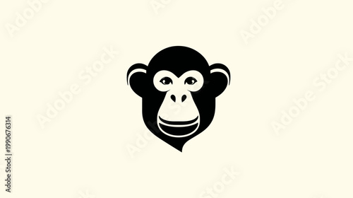 Black and white monkey head icon on a plain background illustration