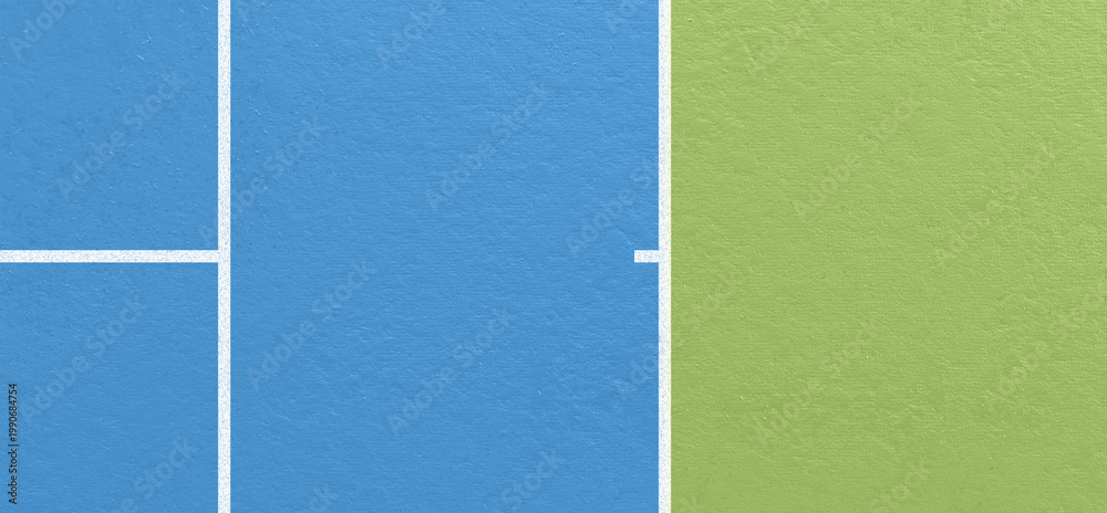 Fototapeta premium Side view of tennis court with blue and green surface divided by white boundary lines