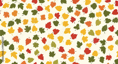 Scattered autumn leaves in red, orange, yellow, and green on a light background