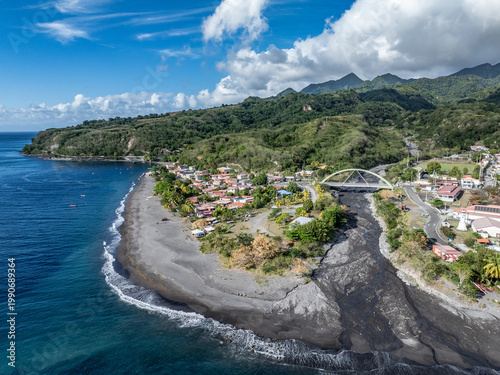aerial landscape view of north part of Le Prêcheur, a coastal village in Martinique, with Pont du Prêcheur crossing 
