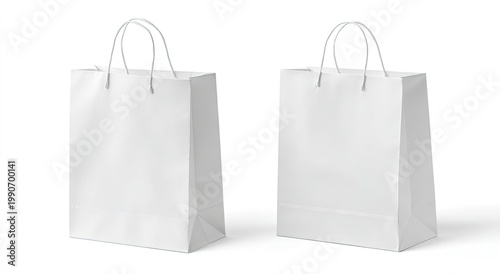 Two plain white paper shopping bags with string handles, isolated on white