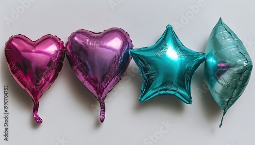 Four shiny foil balloons, two hearts, one star, one diamond, against white