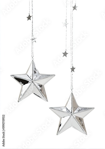 Shiny silver star ornaments on strings against white, simple background