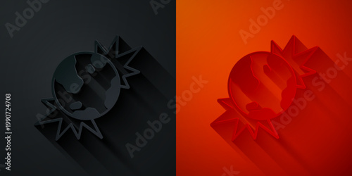 Paper cut Bomb explosive planet earth war danger icon isolated on black and red background. Paper art style. Vector