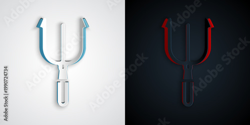 Paper cut Neptune Trident icon isolated on grey and black background. Paper art style. Vector