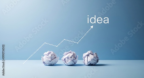 Wallpaper Mural Crinkled papers show an upward trend line with the word idea on a blue background Torontodigital.ca