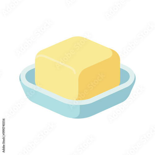 Block of butter sits on a light blue ceramic dish on a white background