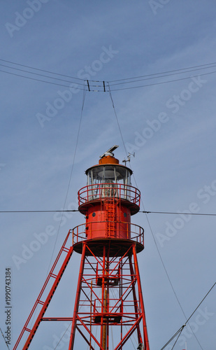 Εκτύπωση καμβά A detailed low-angle view of the red lantern room and steel lattice structure of the historic Lichtschip Texel in Den Helder, Netherlands