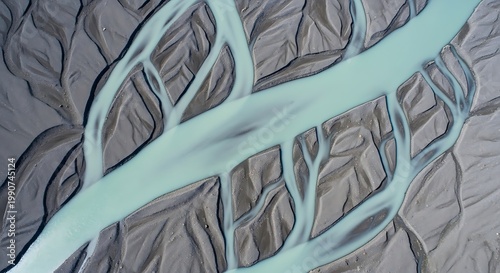 Aerial view of glacial river delta with braided channels and sandy banks