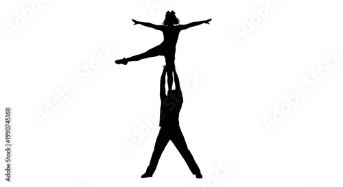 Silhouette of a couple performing a dynamic acrobatic lift in perfect balance showcasing teamwork and strength