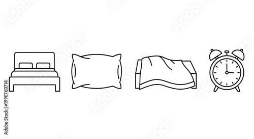 Bed with pillow and blanket and alarm clock.