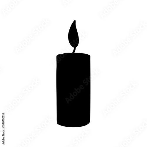 Silhouette of a burning candle creating a warm and mystical ambiance