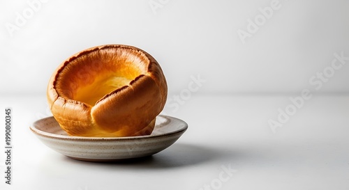 A close-up of a yorkshire pudding on a plate