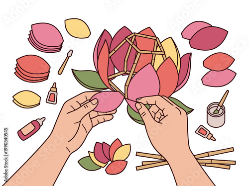 Hands crafting lotus lantern with paper petals and glue traditional festival diy handmade decoration concept