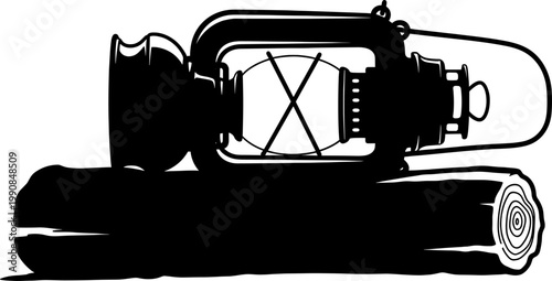 Vintage oil lantern silhouette resting on a wooden log