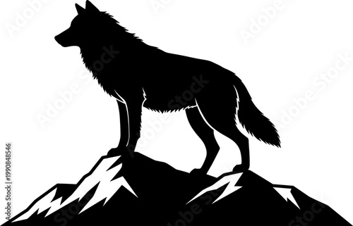 Wild wolf standing on a mountain summit silhouette