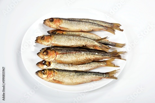 

Hot smoked Baltic herring on a white background