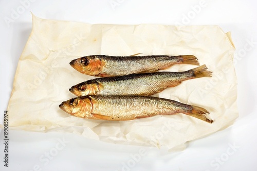 

Hot smoked Baltic herring on a white background