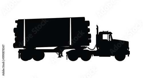 Silhouetted semi truck with a large trailer viewed from the side