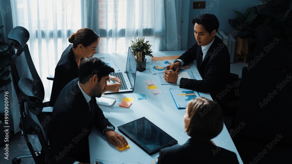 Naklejka premium Top view of smart businesswoman discuss marketing plan at meeting while looking stock market investment chart from businessman. Group of diverse people analyze financial statistic plan. Directorate.
