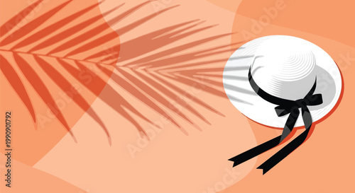Elegant white straw hat with a black ribbon under a palm leaf shadow on an orange background