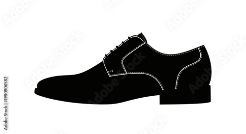 A black oxford shoe is shown in a stark silhouette