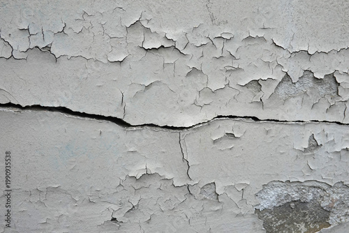 Foto Mur fissuré avec peinture qui s'écaille