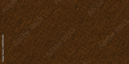 A dark brown rough leather texture material surface with a seamless old grunge skin pattern and macro textile details for a blank backdrop wallpaper design