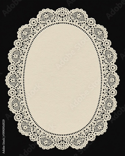 Vintage oval lace doily frame with blank textured paper center on black background. Elegant decorative border with copy space for invitations, greeting cards, menus, scrapbooking or branding.