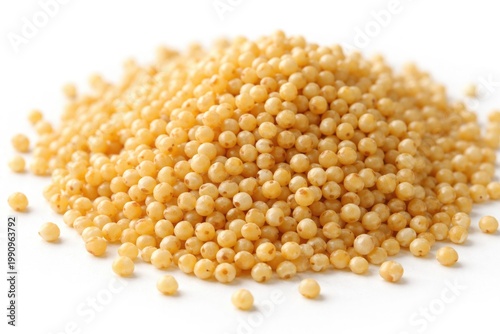 Close up view of dehulled millet grains on white background