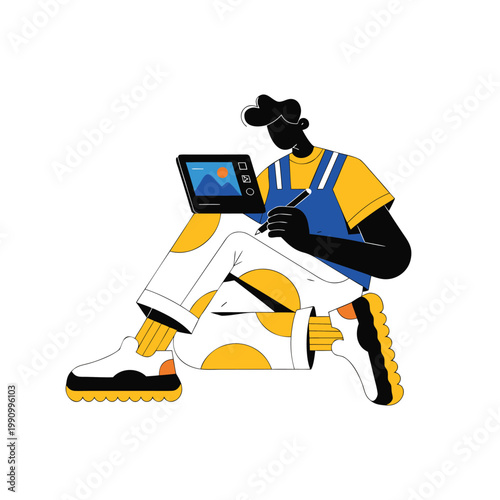 Man sitting and working on a digital tablet with stylus