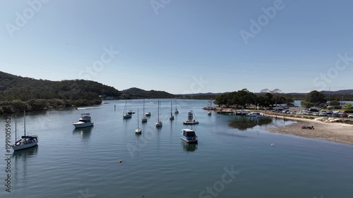 Cinematic Aerial Drone Flyover Rising Above Boats Revealing Bay View at Woy Woy, NSW, Australia