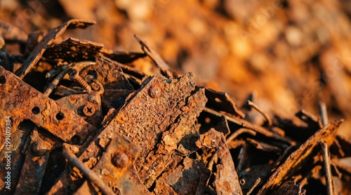 Rusty metal scrap heap with corroded iron pieces