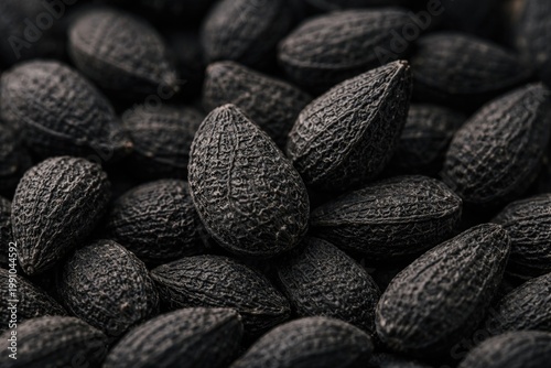 Close up shot of black cumin seeds highlighting seed structure