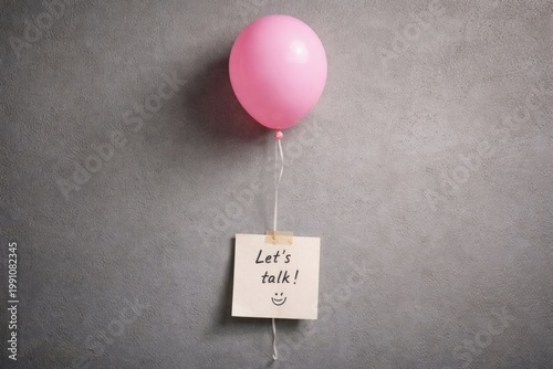 Balloon attached note on gr...