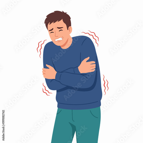 A young man stands with a shivering expression, feeling unwell in cold weather, capturing the essence of chilling temperatures and the human response to discomfort.