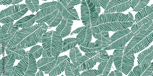 Seamless tropical pattern with green palm leaves on a striped background vector illustration