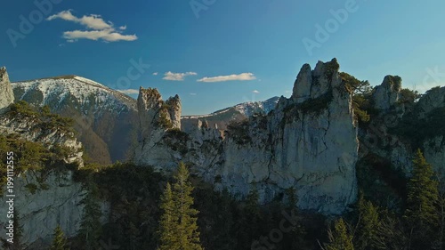 Old Fortresslike Rocky Formations Cast Deep Shadows Across Picturesque Valley In Tatra Slovakia