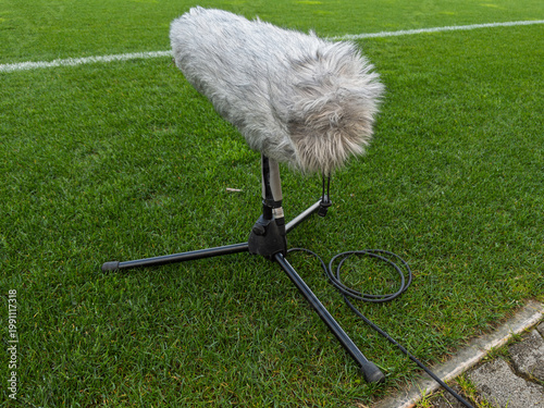 Professional Microphone on the Sidelines of a Soccer Field
